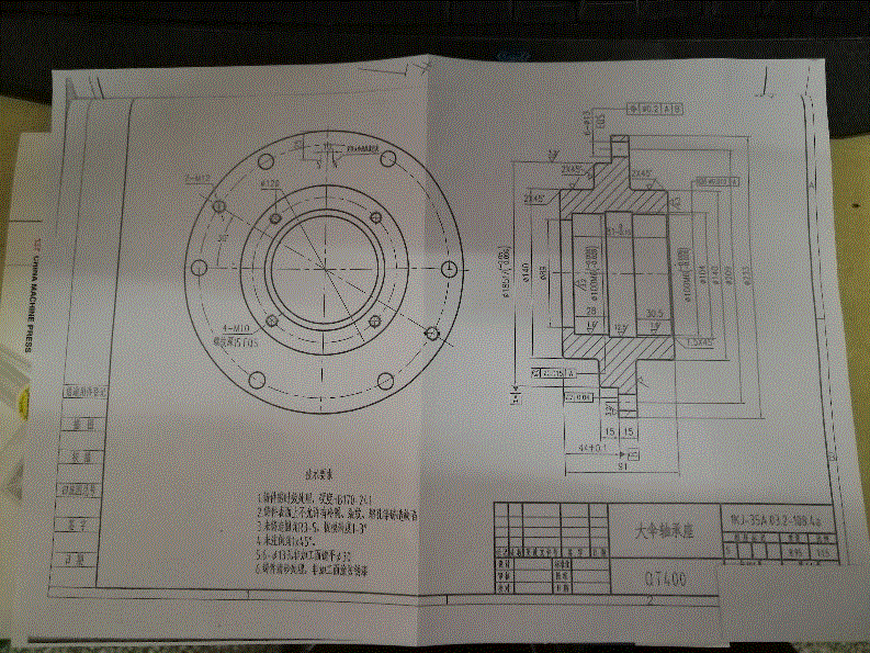 1945--大伞轴承座钻孔机械加工工艺规程及夹具设计钻4-M10的螺纹孔.zip